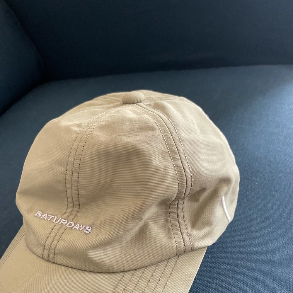 Saturdays nyc hat. Weather tech with magnet back strap